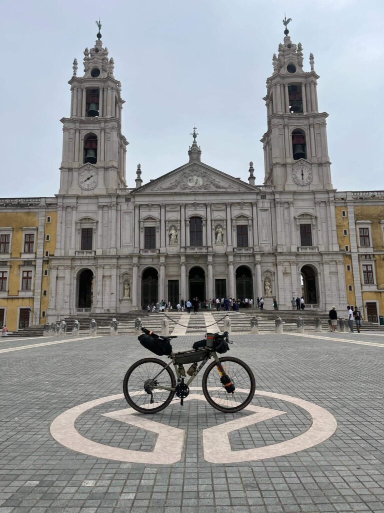 Bikepacking Portugal — Mafra Palace with loaded gravel bike